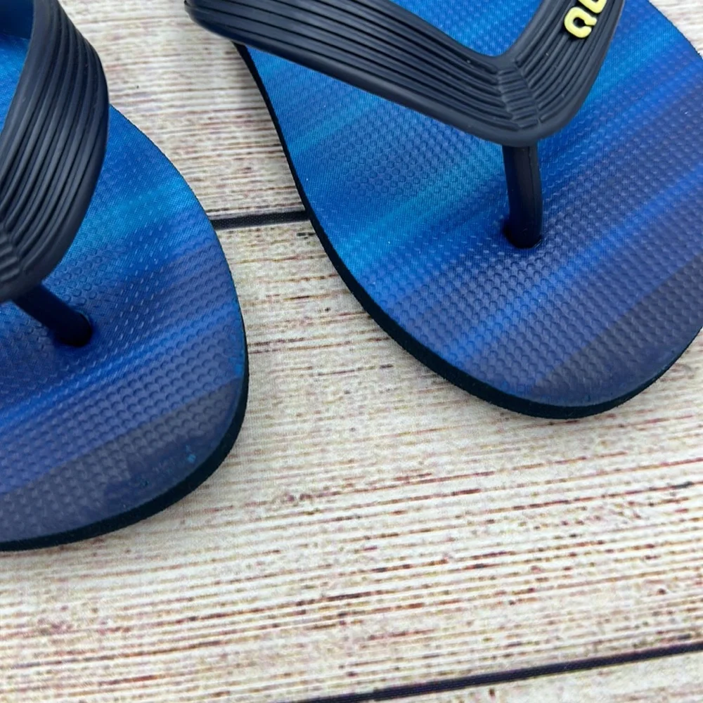 Quicksilver Blue and Yellow Flip Flops Size 11/12